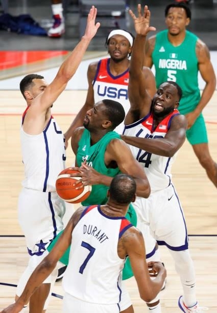 Ekpe Udoh of Nigeria is fouled by Draymond Green of the United States as Zach LaVine, Jerami Grant and Kevin Durant of the United States defend...