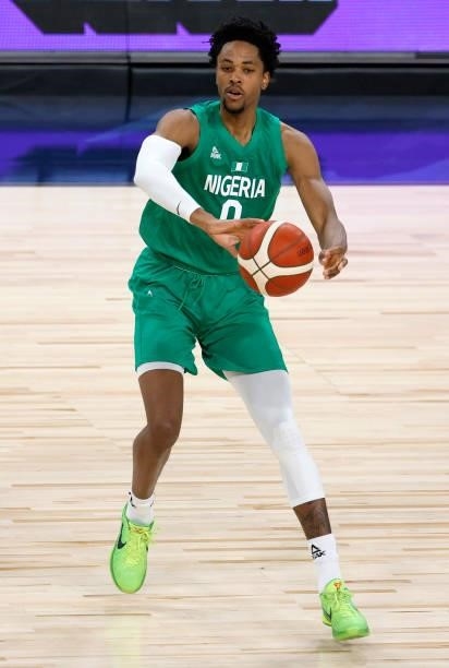 Okpala of Nigeria passes against the United States during an exhibition game at Michelob ULTRA Arena ahead of the Tokyo Olympic Games on July 10,...