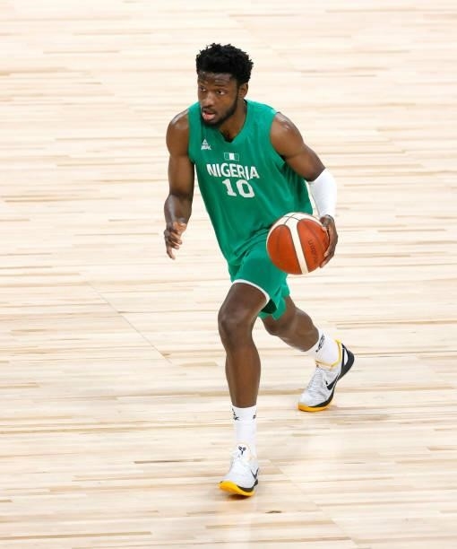 Chimezie Metu of Nigeria brings the ball up the court against the United States during an exhibition game at Michelob ULTRA Arena ahead of the Tokyo...