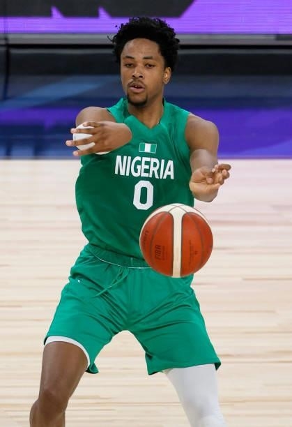 Okpala of Nigeria passes against the United States during an exhibition game at Michelob ULTRA Arena ahead of the Tokyo Olympic Games on July 10,...