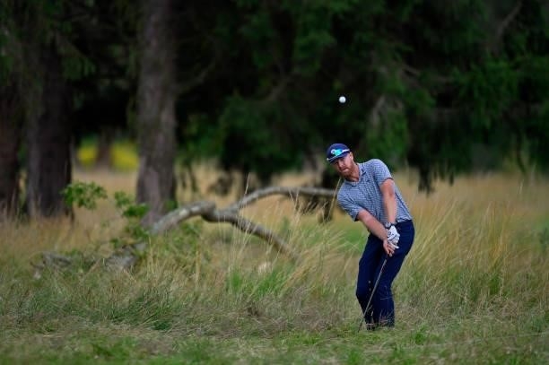 Jacques Blaauw of South Africa plays his third shot out of the rough on the 18th hole green on during Day Four of Le Vaudreuil Golf Challenge at Golf...