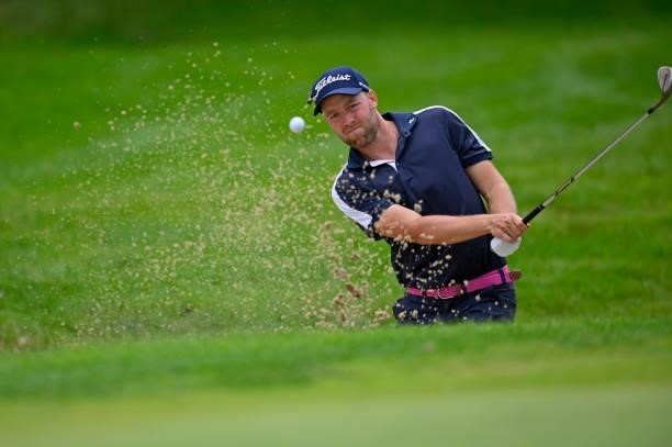 Philip Ericksson of Sweeden plays his third shot out of the bunker on the 18th hole green on during Day Four of Le Vaudreuil Golf Challenge at Golf...