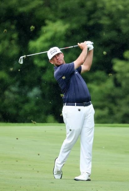 Chez Reavie plays his second shot on the 15th hole during the final round of the John Deere Classic at TPC Deere Run on July 11, 2021 in Silvis,...