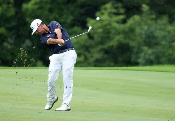 Chez Reavie plays his second shot on the 15th hole during the final round of the John Deere Classic at TPC Deere Run on July 11, 2021 in Silvis,...