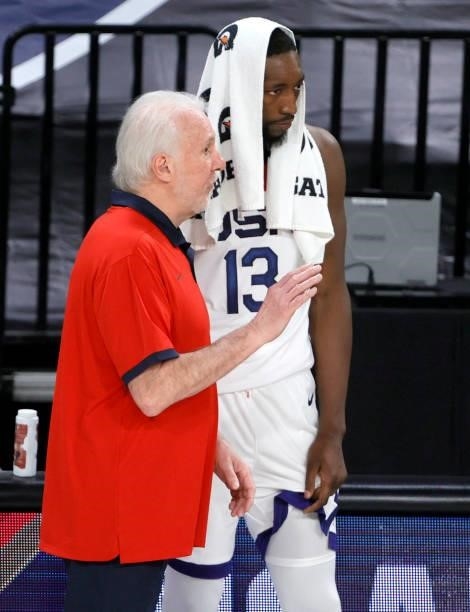 Head coach Gregg Popovich of the United States talks with Bam Adebayo during an exhibition game against Nigeria at Michelob ULTRA Arena ahead of the...