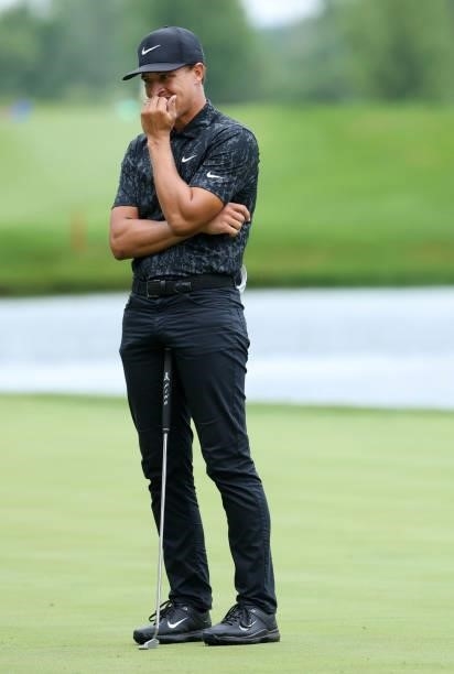 Cameron Champ reacts to a missed birdie putt on the 18th green during the final round of the John Deere Classic at TPC Deere Run on July 11, 2021 in...