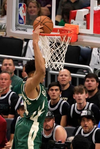 Giannis Antetokounmpo of the Milwaukee Bucks dunks the ball during the first half in Game Three of the NBA Finals against the Phoenix Suns at Fiserv...