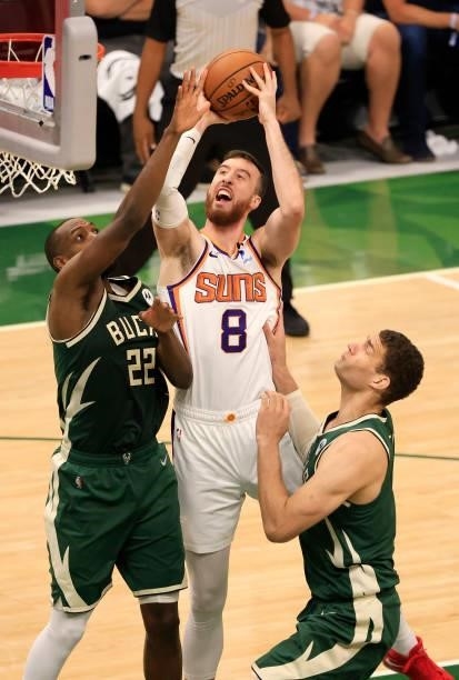 Frank Kaminsky of the Phoenix Suns takes a shot over Khris Middleton of the Milwaukee Bucks during the first half in Game Three of the NBA Finals at...