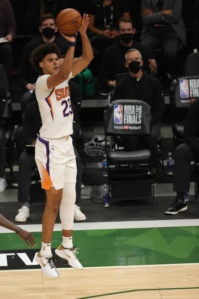Cameron Johnson of the Phoenix Suns takes a jump shot during the first half in Game Three of the NBA Finals against the Milwaukee Bucks at Fiserv...