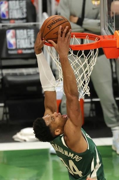 Giannis Antetokounmpo of the Milwaukee Bucks goes up for a dunk during the second half in Game Three of the NBA Finals against the Phoenix Suns at...