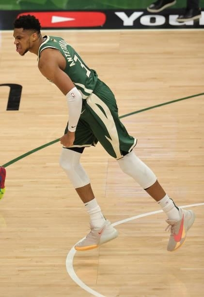 Giannis Antetokounmpo of the Milwaukee Bucks celebrates after a dunk during the second half in Game Three of the NBA Finals against the Phoenix Suns...