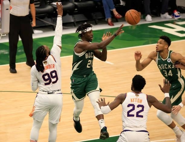 Jrue Holiday of the Milwaukee Bucks passes the ball during the second half in Game Three of the NBA Finals against the Phoenix Suns at Fiserv Forum...
