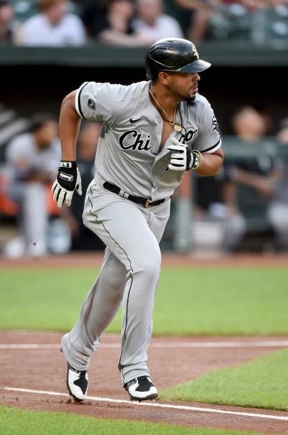 Jose Abreu of the Chicago White Sox runs to first base against theBaltimore Orioles at Oriole Park at Camden Yards on July 09, 2021 in Baltimore,...