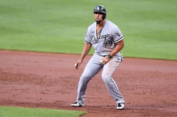 Jose Abreu of the Chicago White Sox takes a lead off of first base against the Baltimore Orioles at Oriole Park at Camden Yards on July 09, 2021 in...