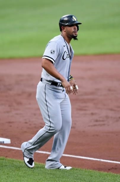 Jose Abreu of the Chicago White Sox takes a lead off of third base against the Baltimore Orioles at Oriole Park at Camden Yards on July 09, 2021 in...