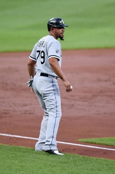 Jose Abreu of the Chicago White Sox takes a lead off of third base against the Baltimore Orioles at Oriole Park at Camden Yards on July 09, 2021 in...
