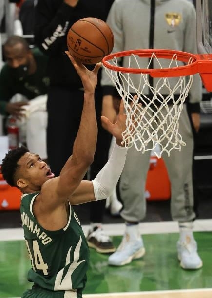 Giannis Antetokounmpo of the Milwaukee Bucks goes up for a layup during the second half in Game Three of the NBA Finals against the Phoenix Suns at...