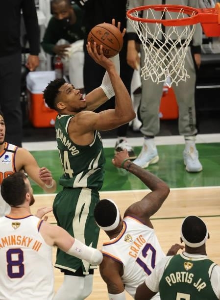 Giannis Antetokounmpo of the Milwaukee Bucks goes up for a shot against the Phoenix Suns during the second half in Game Three of the NBA Finals at...