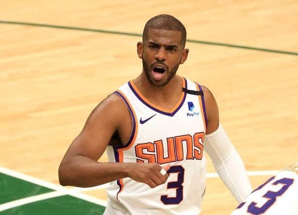 Chris Paul of the Phoenix Suns reacts against the Milwaukee Bucks during the second half in Game Three of the NBA Finals at Fiserv Forum on July 11,...