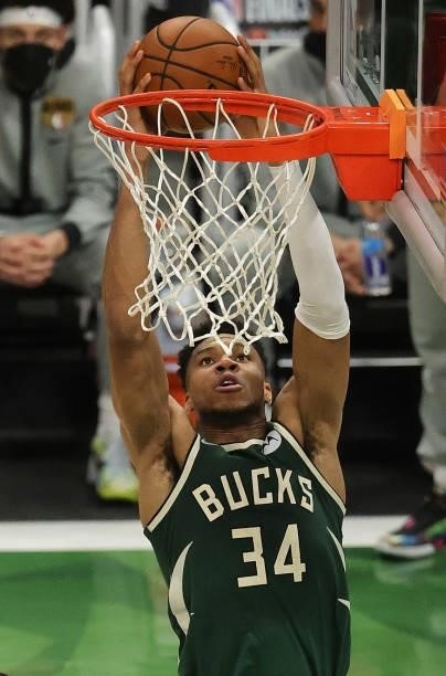 Giannis Antetokounmpo of the Milwaukee Bucks dunks the ball during the second half in Game Three of the NBA Finals against the Phoenix Suns at Fiserv...