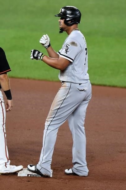 Jose Abreu of the Chicago White Sox celebrates after hitting a double against the Baltimore Orioles at Oriole Park at Camden Yards on July 09, 2021...