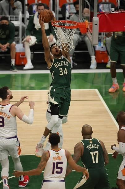 Giannis Antetokounmpo of the Milwaukee Bucks dunks against the Phoenix Suns during the second half in Game Three of the NBA Finals at Fiserv Forum on...