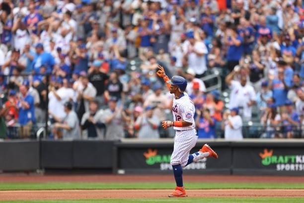 Francisco Lindor of the New York Mets gestures after he hit a two-run home run against the Pittsburgh Pirates during the first inning of a game at...