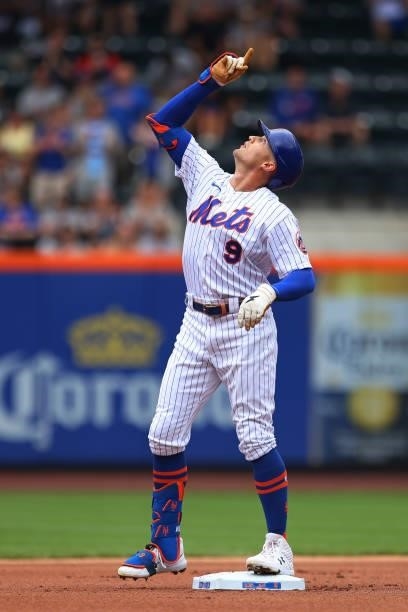 Brandon Nimmo of the New York Mets gestures after he hit a double against the Pittsburgh Pirates during the first inning of a game at Citi Field on...