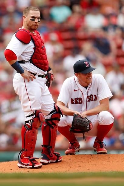 Christian Vazquez of the Boston Red Sox and Nick Pivetta look on from the pitchers mound during the fourth inning against the Philadelphia Phillies...
