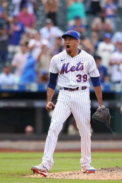 Closer Edwin Diaz of the New York Mets reacts after getting the final out of the eighth inning against the Pittsburgh Pirates in a game at Citi Field...