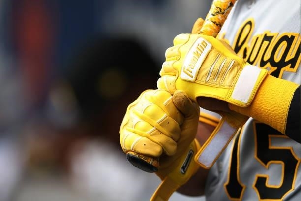 The Franklin batting gloves worn by Wilmer Difo of the Pittsburgh Pirates in action against the New York Mets during of a game at Citi Field on July...