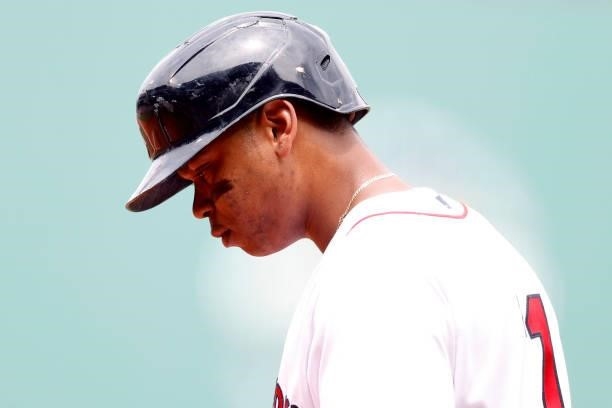 Rafael Devers of the Boston Red Sox looks on during the second inning against the Philadelphia Phillies at Fenway Park on July 11, 2021 in Boston,...