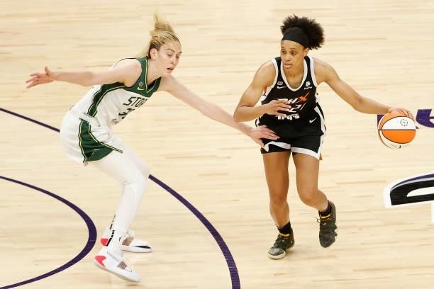 Brianna Turner of the Phoenix Mercury handles the ball against Breanna Stewart of the Seattle Storm during the first half of the WNBA game at Phoenix...
