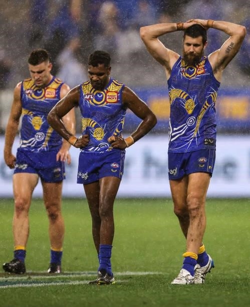 Elliot Yeo, Liam Ryan and Josh J. Kennedy of the Eagles look on after being defeated during the round 17 AFL match between the West Coast Eagles and...