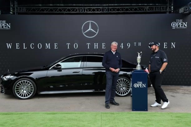In this handout picture provided by the R&A, 2019 winner Shane Lowry of Ireland and Martin Slumbers, Chief Executive of the R&A pose for a photograph...
