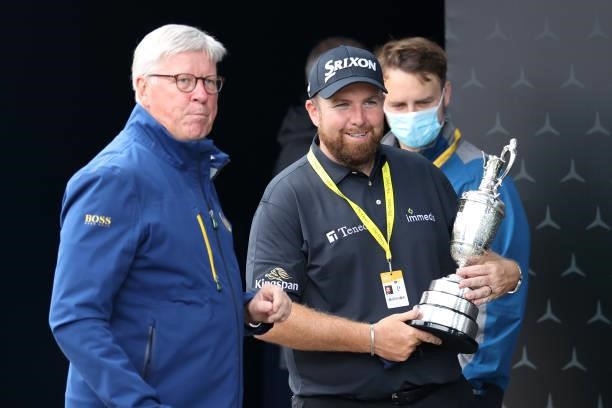 In this handout picture provided by the R&A, 2019 winner Shane Lowry of Ireland carries the Claret Jug trophy during a practice round for The 149th...