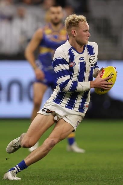 Jaidyn Stephenson of the Kangaroos in action during the round 17 AFL match between the West Coast Eagles and North Melbourne Kangaroos at Optus...
