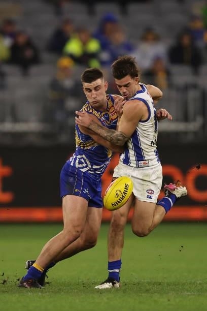 Elliot Yeo of the Eagles and Jy Simpkin of the Kangaroos contests for the ball during the round 17 AFL match between the West Coast Eagles and North...