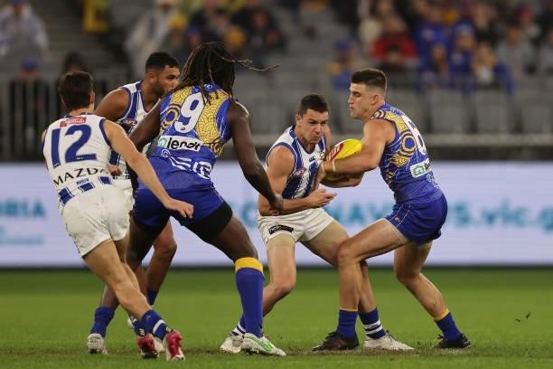Luke Davies-Uniacke of the Kangaroos and Elliot Yeo of the Eagles contest for the ball during the round 17 AFL match between the West Coast Eagles...
