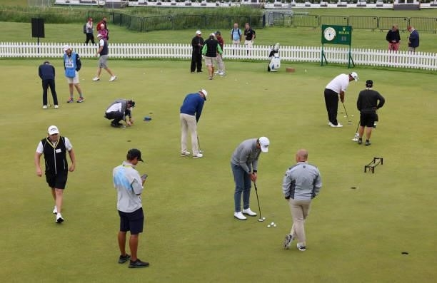 Players practice putting during a practice round for The 149th Open at Royal St George’s Golf Club on July 12, 2021 in Sandwich, England.