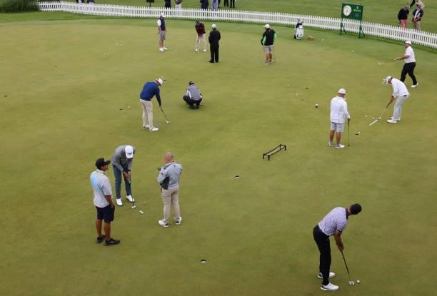 Players practice putting during a practice round for The 149th Open at Royal St George’s Golf Club on July 12, 2021 in Sandwich, England.