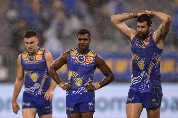 Elliot Yeo, Liam Ryan and Josh J. Kennedy of the Eagles look on after being defeated during the round 17 AFL match between the West Coast Eagles and...