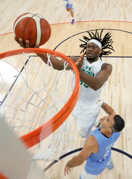 Precious Achiuwa of Nigeria drives to the basket against Luis Scola of Argentina during an exhibition game at Michelob ULTRA Arena ahead of the Tokyo...