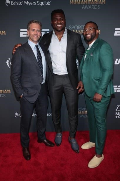 Max Kellerman, Francis Ngannou and guest attend the 2021 Sports Humanitarian Awards on July 12, 2021 in New York City.