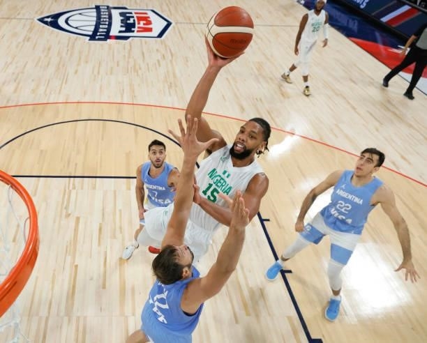 Jahlil Okafor of Nigeria shoots against Marcos Delia of Argentina during an exhibition game at Michelob ULTRA Arena ahead of the Tokyo Olympic Games...