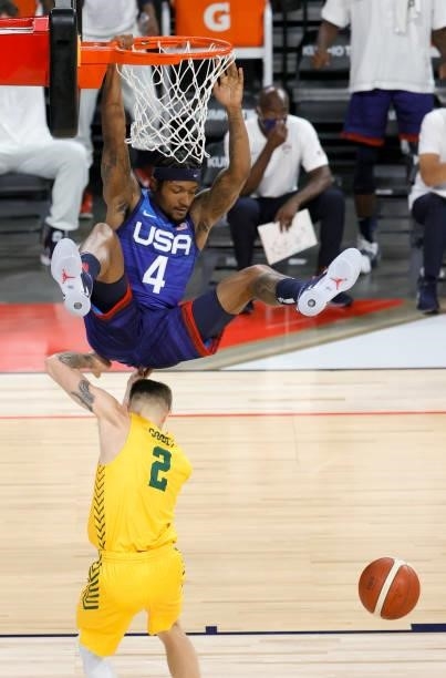 Bradley Beal of the United States dunks against Nathan Sobey of the Australia Boomers during an exhibition game at Michelob Ultra Arena ahead of the...
