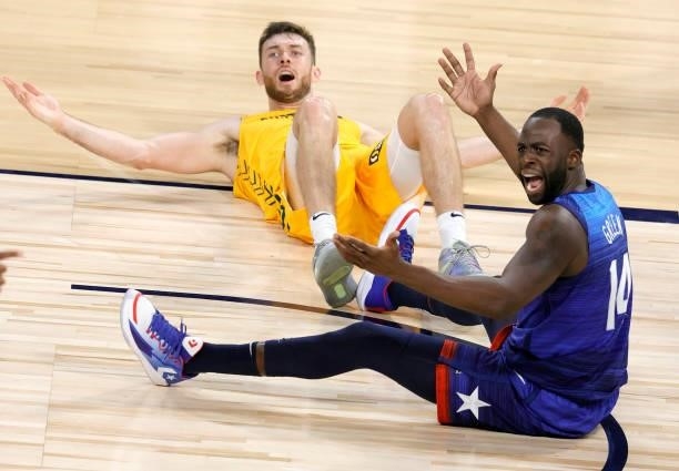 Nick Kay of the Australia Boomers and Draymond Green of the United States react after Kay fouled Green during an exhibition game at Michelob Ultra...