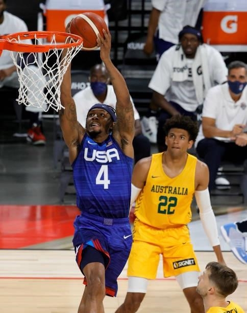 Bradley Beal of the United States dunks ahead of Matisse Thybulle of the Australia Boomers during an exhibition game at Michelob Ultra Arena ahead of...