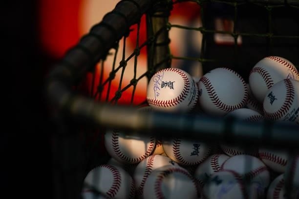 Ball signed by Trey Manchini of the Baltimore Orioles sits in the ball cart during the 2021 T-Mobile Home Run Derby at Coors Field on July 12, 2021...