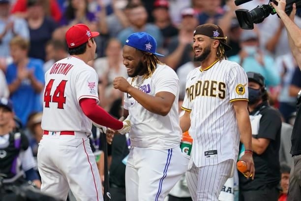 Shohei Ohtani of the Los Angeles Angels is congratulated by American League All-Star Vladimir Guerrero Jr. #27 of the Toronto Blue Jays during the...